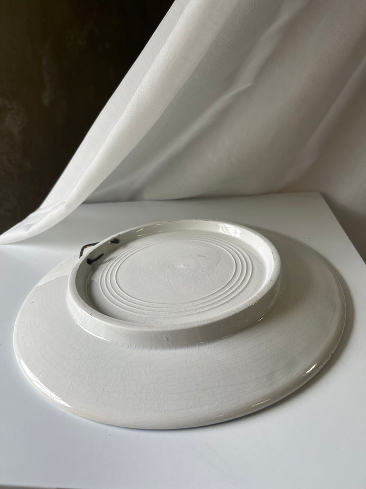 Blå hvid porcelænplatte med slotsmotov