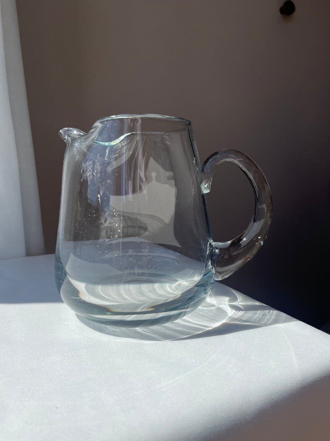 Glass jug, mouth-blown, solid