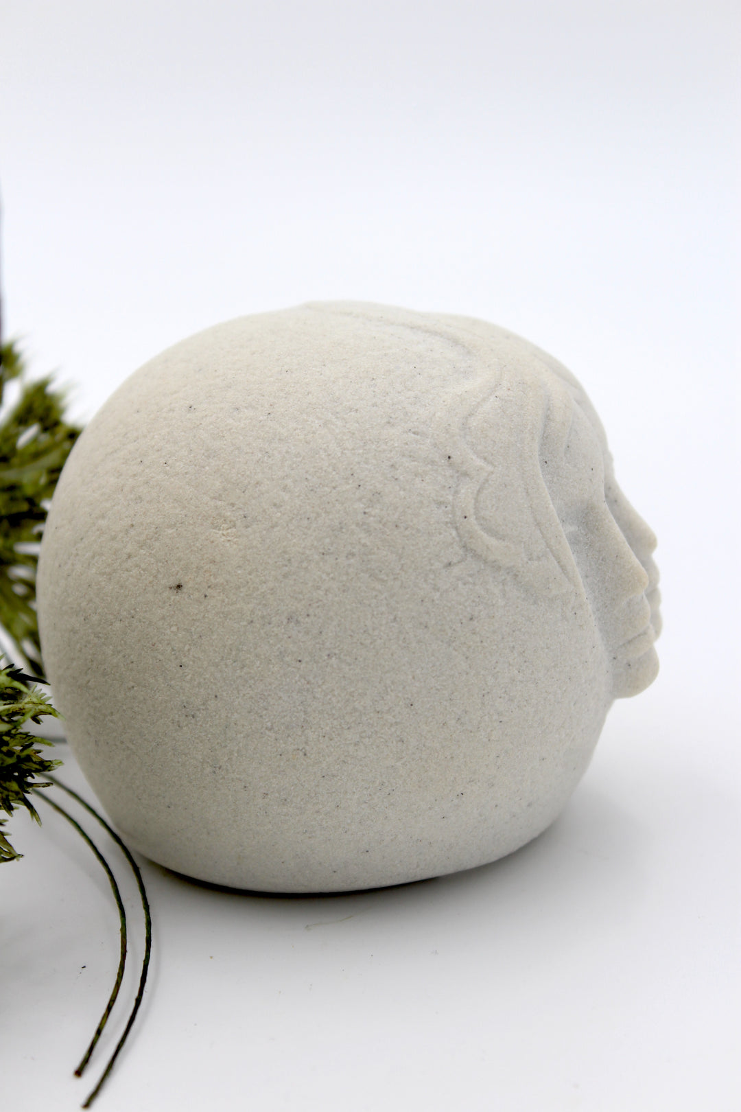 Marbell - Sandstone figure, Faces