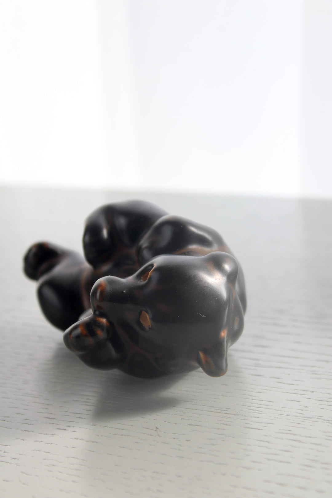 Royal Copenhagen - Lying bear cub, no. 21432