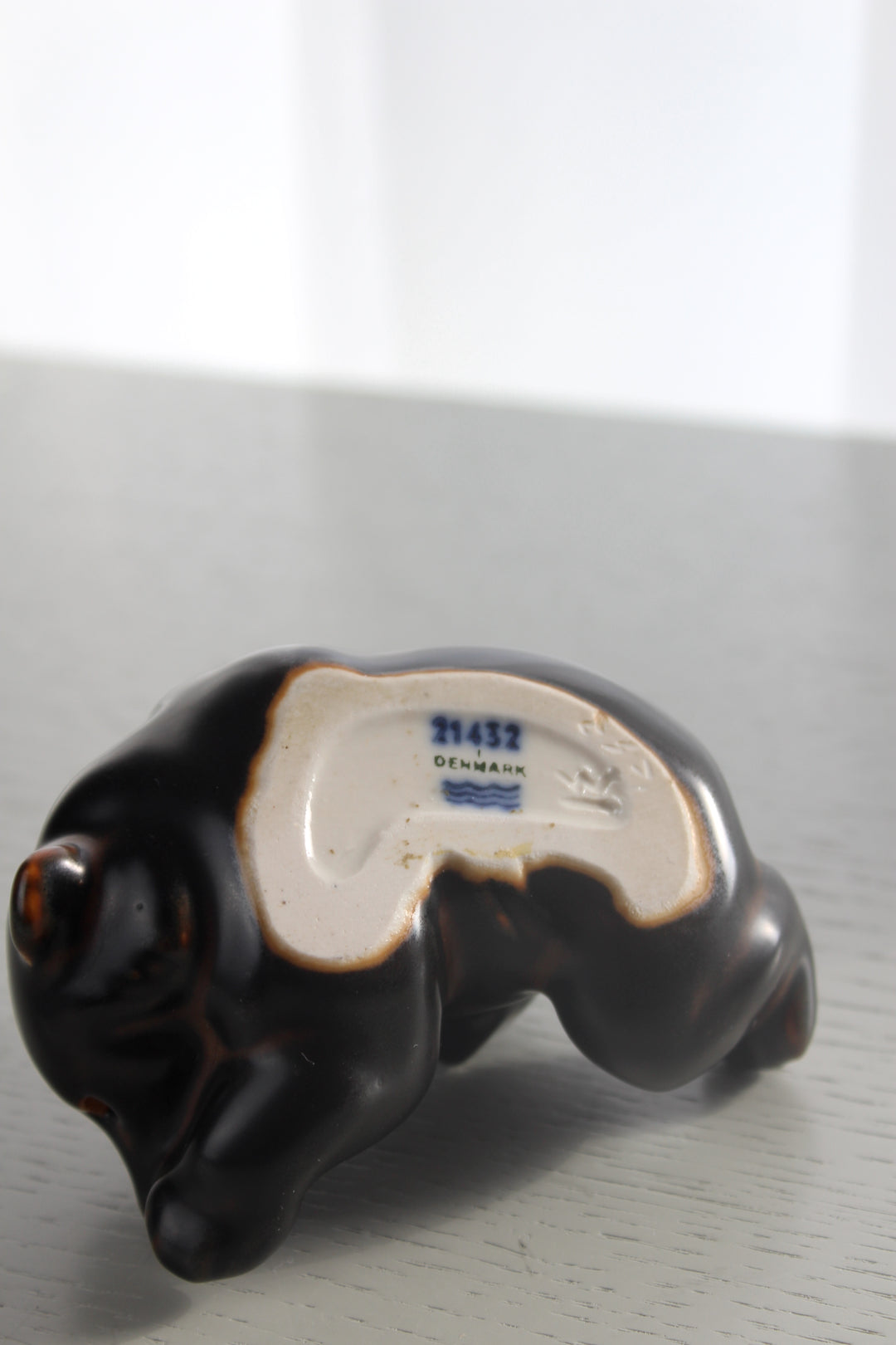 Royal Copenhagen - Lying bear cub, no. 21432
